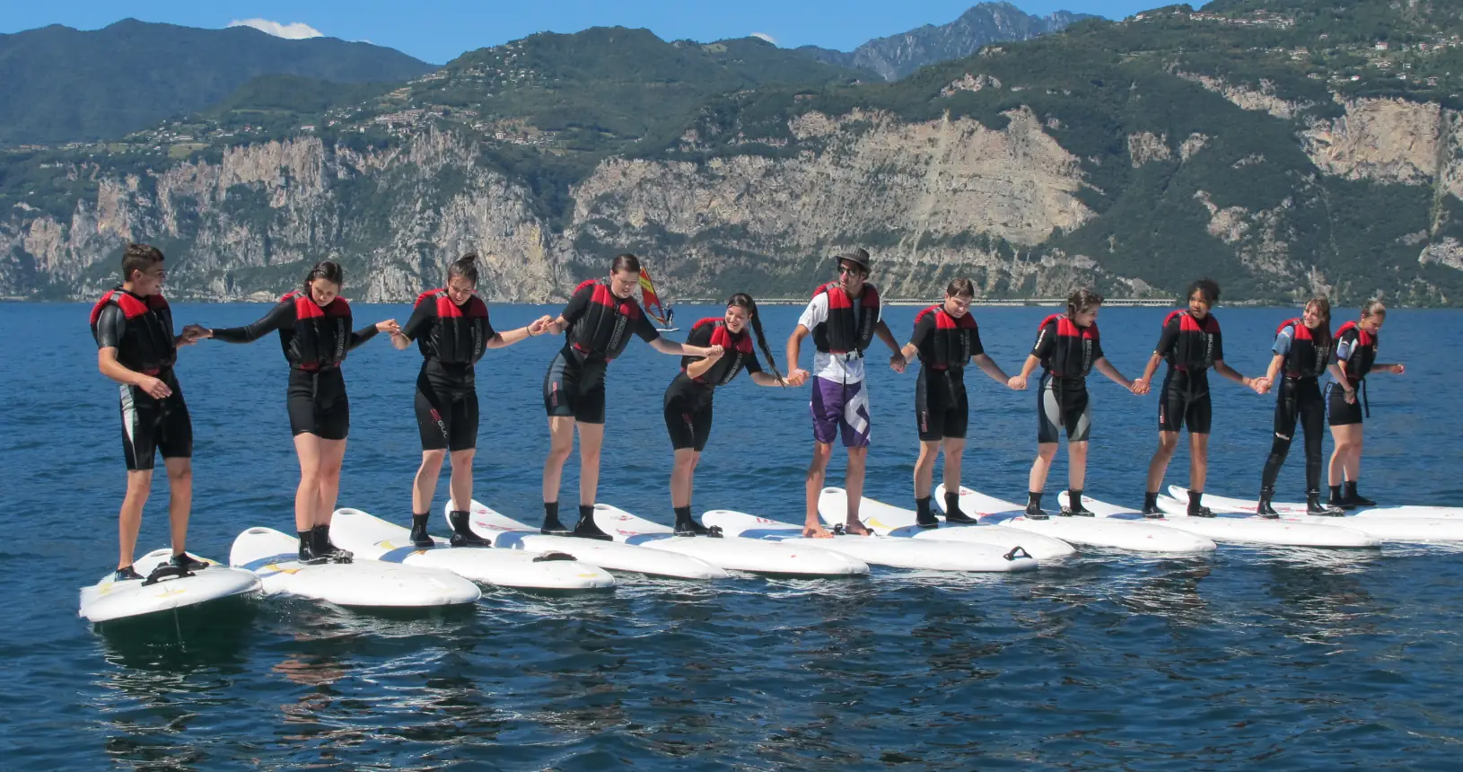Windsurf Balancing on board on a beginner course on Lake Garda